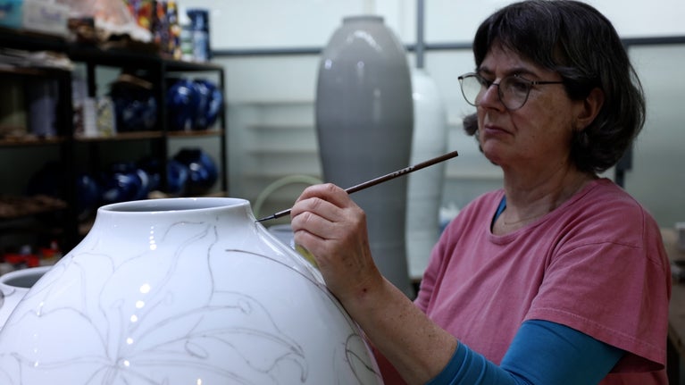Felicity Aylieff at work on her 'fencai' enamelled vessels